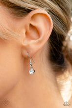 Load image into Gallery viewer, Small rhinestone hanging from a silver fish hook earring.
