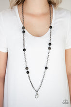 Load image into Gallery viewer, Shiny black beads and ornate gunmetal beads trickle along a bold gunmetal chain, creating a colorfully industrial look across the chest. A lobster clasp hangs from the bottom of the design to allow a name badge or other item to be attached. Features an adjustable clasp closure.  Sold as one individual lanyard. Includes one pair of matching earrings.
