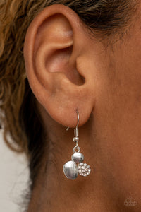 Silver flat cluster, hanging from a silver fish hook earring.