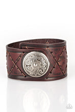 Load image into Gallery viewer, Featuring a flowery silver bead, a thick brown leather band has been stitched in diamond patterns across the front for a rugged look. Features an adjustable snap closure. Sold as one individual bracelet.
