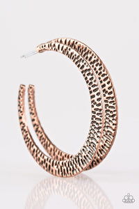 Delicately hammered in shimmery textures, a glistening copper hoop curls around the ear for a fierce fashion. Earring attaches to a standard post fitting. Hoop measures 2" in diameter. Sold as one pair of hoop earrings.