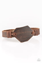 Load image into Gallery viewer, An imperfect piece of leather is knotted in place around a distressed brown leather band for a rugged look. Features an adjustable snap closure. Sold as one individual bracelet.
