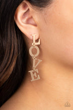 Load image into Gallery viewer, Gold letters with a lightly hammered sheen spell out the word &quot;LOVE&quot; as they vertically cascade down the ear in a flattering finish. Each of the letters are interconnected to one another giving the piece some whimsically playful movement. Earring attaches to a standard post fitting.  Sold as one pair of post earrings.
