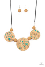 Load image into Gallery viewer, Featuring blue accents, cork-like frames and brown matte beads are threaded along an invisible wire below the collar for a statement-making look. Features an adjustable clasp closure.  Sold as one individual necklace. Includes one pair of matching earrings.
