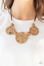 Load image into Gallery viewer, Featuring blue accents, cork-like frames and brown matte beads are threaded along an invisible wire below the collar for a statement-making look. Features an adjustable clasp closure.  Sold as one individual necklace. Includes one pair of matching earrings.
