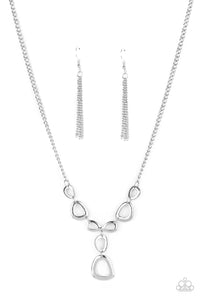 Irregular shaped silver rings connect to a sliver chain as they make their way across the collar. Two rings dangle from the center for a stylish avant-garde fashion. Features an adjustable clasp closure. Includes one pair of matching earrings.