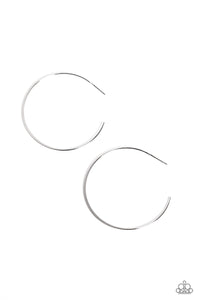 A classic silver bar curls into an outrageously oversized hoop for a trendsetting look. Earring attaches to a standard post fitting. Hoop measures approximately 4" in diameter.  Sold as one pair of hoop earrings.