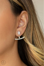 Load image into Gallery viewer, Encrusted in glassy white rhinestones, a dainty silver teardrop attaches to a double-sided post, designed to fasten behind the ear. Radiating with a row of glassy white rhinestones, a bowing silver frame peeks out beneath the ear for a bold look. Earring attaches to a standard post fitting.  Sold as one pair of double-sided post earrings.
