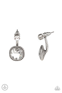 A solitaire white rhinestone attaches to a double-sided post, designed to fasten behind the ear. Featuring a faceted white gem, the glitzy double-sided post peeks out beneath the ear for a refined look. Earring attaches to a standard post fitting.  Sold as one pair of double-sided post earrings.