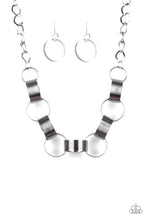 Load image into Gallery viewer, Etched in linear patterns, dramatically oversized silver links connect below the collar for a bold statement-making look. Features an adjustable clasp closure.  Sold as one individual necklace. Includes one pair of matching earrings.

