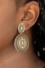 Load image into Gallery viewer, Stamped in decorative linear patterns, a ruffled brass frame dangles from the bottom of a matching oval frame, creating a one-of-a-kind lure. Earring attaches to a standard clip-on fitting.  Sold as one pair of clip-on earrings.

