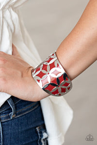 A thick piece of Samba leather peeks out through a daisy stenciled silver cuff, creating a colorful centerpiece around the wrist.  Sold as one individual bracelet.