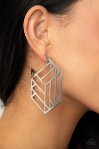 Flat silver bars connect into an edgy hexagonal frame, creating a chic geometric hoop. Earring attaches to a standard post fitting. Hoop measures approximately 2 3/4" in diameter.  Sold as one pair of hoop earrings.