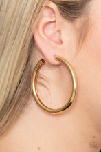Load image into Gallery viewer, A thick gold bar delicately curls into a glistening oversized hoop for a retro look. Earring attaches to a standard post fitting. Hoop measures approximately 2 1/4&quot; in diameter.  Sold as one pair of hoop earrings.
