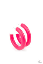 Load image into Gallery viewer, Painted in a flamboyant Pink Peacock finish, a thick wood hoop curls around the ear for a flirtatiously colorful look. Earring attaches to a standard post fitting. Hoop measures approximately 2&quot; in diameter.  Sold as one pair of hoop earrings.
