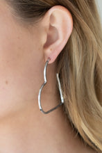 Load image into Gallery viewer, A flat silver bar delicately bends into an airy heart frame for a flirtatious finish. Earring attaches to a standard post fitting. Hoop measures approximately 2&quot; in diameter.  Sold as one pair of hoop earrings.
