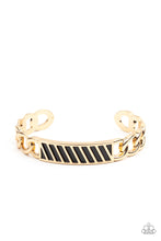 Load image into Gallery viewer, Gold chain-like bars attach to a riveted gold centerpiece, creating a statement-making cuff around the wrist.  Sold as one individual bracelet.
