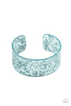 Load image into Gallery viewer, Dainty silvery shavings are encased in a thick blue acrylic cuff, creating an icy incandescence around the wrist.  Sold as one individual bracelet.
