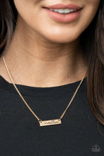 Load image into Gallery viewer, Stamped in a heart and the word, &quot;Mother,&quot; a glistening gold plate is suspended by a classic gold chain below the collar, creating a whimsy sentimental pendant. Features an adjustable clasp closure.  Sold as one individual necklace. Includes one pair of matching earrings.
