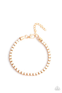 A thick strand of glistening gold box chain links around the wrist for a bold look. Features an adjustable clasp closure.