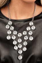 Load image into Gallery viewer, Encased in sleek silver fittings, dramatically oversized white rhinestones delicately link into twinkly tassels that taper off into a jaw-dropping fringe below the collar. Features an adjustable clasp closure.  Sold as one individual necklace. Includes one pair of matching earrings.
