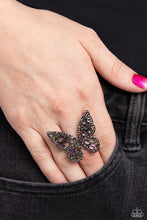 Load image into Gallery viewer, Dainty oil spill emerald-cut rhinestones are sprinkled across the gunmetal wings of a butterfly that is encrusted in dauntless hematite rhinestones for a dramatically dazzling finish. Features a stretchy band for a flexible fit.  Sold as one individual ring.
