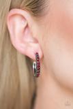 Load image into Gallery viewer, Encrusted in dazzling red rhinestones, a studded silver hoop swings from the ear for a glamorous look. Earring attaches to a standard post fitting. Hoop measures 1&quot; in diameter. Sold as one pair of hoop earrings.
