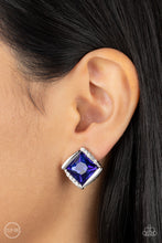 Load image into Gallery viewer, Shiny silver bars gently overlap with white rhinestone encrusted silver bars around a square cut blue rhinestone, resulting in a refined radiance. Earring attaches to a standard clip-on fitting.  Sold as one pair of clip-on earrings.
