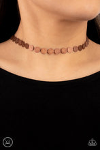 Load image into Gallery viewer, Delicately scratched in a blinding shimmer, a row of dainty copper discs shines around the neck for a minimalistic sheen. Features an adjustable clasp closure.  Sold as one individual choker necklace. Includes one pair of matching earrings.
