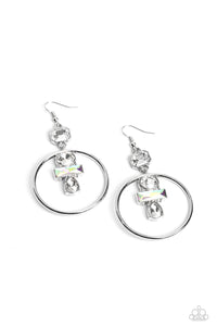 Dangling from an asscher-cut white gem, a trio of white and iridescent geometric-shaped gems glimmer inside airy silver hoops. Earring attaches to a standard fishhook fitting. Due to its prismatic palette, color may vary.  Sold as one pair of earrings.