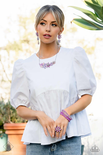 Necklace set with earrings, bracelet and ring displayed on a Model.