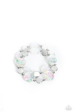 Load image into Gallery viewer, Shiny silver discs, studs, and asymmetrical clear discs featuring an iridescent shimmer coalesce around the wrist on elastic stretchy bands for an attention-grabbing shimmer. Due to its prismatic palette, color may vary.  Sold as one set of two bracelets.
