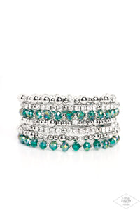 An icy collection of silver beads, cubes, opaque green crystals with an iridescent shimmer, and glassy white rhinestones are threaded along a coiled wire, creating a blinding infinity wrap style bracelet around the wrist. Due to its prismatic palette, color may vary.  Sold as one individual bracelet.