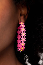 Load image into Gallery viewer, A dainty collection of hot pink daisies with yellow centers blooms into a free-spirited hoop around the ear. Earring attaches to a standard post fitting. Hoop measures approximately 2&quot; in diameter.  Sold as one pair of hoop earrings.
