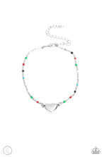 Load image into Gallery viewer, A dainty strand of multicolored beaded silver chain wraps around the ankle for a dainty pop of color. An imperfect silver heart rests in the center of the beaded strand for a romantic finish. Features an adjustable clasp closure.  Sold as one individual anklet.
