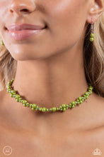 Load image into Gallery viewer, Dipped in an iridescent finish, varying sizes of green pearls cluster around the neckline in a dreamy pop of color. Dainty silver beads alternate along the collar and pearly clusters for a touch of industrial shimmer. Features an adjustable clasp closure. Due to its prismatic palette, color may vary.   Featured inside The Preview at Made for More! Sold as one individual choker necklace. Includes one pair of matching earrings.
