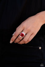Load image into Gallery viewer, Featuring a white shell backdrop, high-sheen red petals fan out from the center of the oval display, creating a regal rose atop airy silver bands on the finger. Features a stretchy band for a flexible fit.  Sold as one individual ring.
