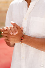 Load image into Gallery viewer, Infused along a stretchy band around the wrist, a strand of colorful glassy, stone, and acrylic beads joins a spotted collection of wood beads for a colorfully urban look. As the stone elements in this piece are natural, some color variation is normal.  Sold as one individual bracelet.
