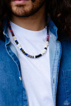 Load image into Gallery viewer, Colorful sections of multicolored beads and gray crackle bead accents adorn a strand of chiseled and round white marbled stones and stone beads, creating an earthy compliment below the collar. Features an adjustable clasp closure. As the stone elements in this piece are natural, some color variation is normal.  Sold as one individual necklace.
