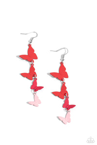 A collection of red, pink, and baby pink butterflies fall from the ear in an alternating, haphazard pattern, slowly decreasing in size, culminating in a whimsical lure. Earring attaches to a standard fishhook fitting.  Sold as one pair of earrings.