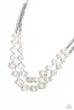 Load image into Gallery viewer, Featuring a subtle scratch surface, a bubbly collection of white pearls, abstract iridescent beads, and sparkly crystal-like iridescent beads are threaded along metallic rods that trickle in a two-layer display, creating an elegantly effervescent display below the collar. Features an adjustable clasp closure. Due to its prismatic palette, color may vary.  Sold as one individual necklace. Includes one pair of matching earrings.
