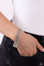 Load image into Gallery viewer, Separated by white rhinestones, rhinestone-covered silver bars and thin sleek silver bars alternate around the wrist for a glitzy display. Features an adjustable clasp closure.  Sold as one individual bracelet.
