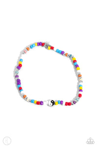 Infused along an elastic stretchy band, multicolored seed beads, silver studs, circular colored stones, a silver star, and a yin-yang bead coalesce around the ankle for a fun-loving display. Sold as one individual anklet.