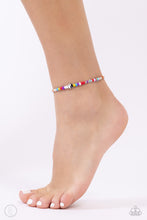 Load image into Gallery viewer, Infused along an elastic stretchy band, multicolored seed beads, silver studs, circular colored stones, a silver star, and a yin-yang bead coalesce around the ankle for a fun-loving display. Sold as one individual anklet.
