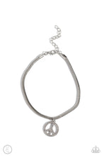 Load image into Gallery viewer, A silver peace sign infused with dazzling white rhinestones effortlessly slides along a thick silver snake chain, creating an irresistible pendant. Features an adjustable clasp closure. Sold as one individual anklet.
