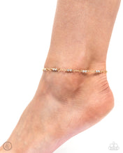 Load image into Gallery viewer, Infused along a classic chain, duos of white gems pressed in circular gold fittings glisten around the ankle for a simplistic shimmer. Features an adjustable clasp closure. Sold as one individual anklet.
