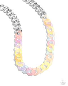 Featuring a kaleidoscope of colors, acrylic rings connect to high-sheen silver curb chain links for a magically multicolored display. Features an adjustable clasp closure. Sold as one individual necklace. Includes one pair of matching earrings.