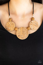 Load image into Gallery viewer, Featuring white accents, cork-like frames and brown matte beads are threaded along an invisible wire below the collar for a statement-making look. Features an adjustable clasp closure.  Sold as one individual necklace. Includes one pair of matching earrings.
