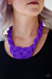 Countless strands of purple seed beads are twisted and knotted together to create an unforgettable statement piece. Features an adjustable clasp closure. Sold as one individual necklace. Includes one pair of matching earrings.