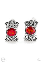 Load image into Gallery viewer, Brushed in an antiqued shimmer, vine-like filigree climbs into a glistening silver hoop. A glittery red rhinestone is pressed into the top of the frame for a regal finish. Earring attaches to a standard clip-on fitting. Sold as one pair of clip-on earrings.
